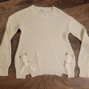 Elegant Cream Sweater with Bow Accents